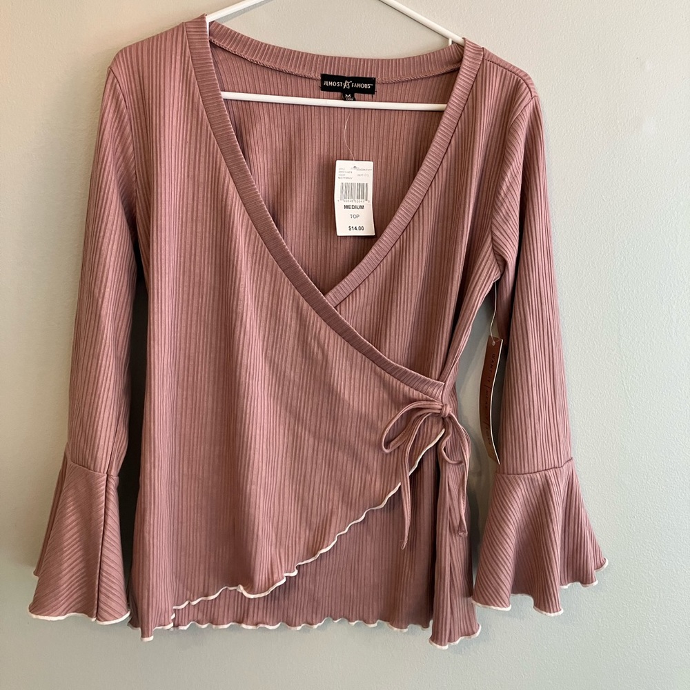 Almost famous pink sweater top bow detail faux wrap front and flounce sleeves